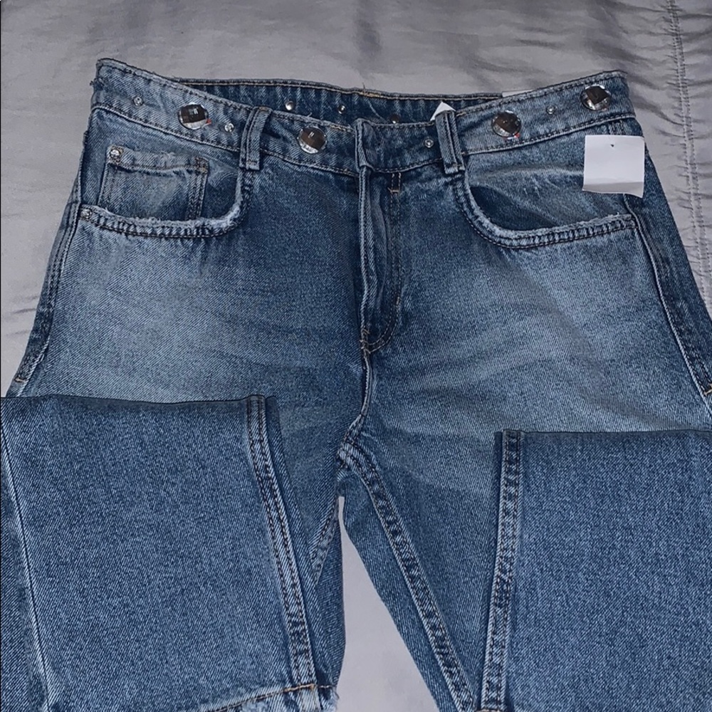 New Zara jeans with rhinestone across belt hoops.